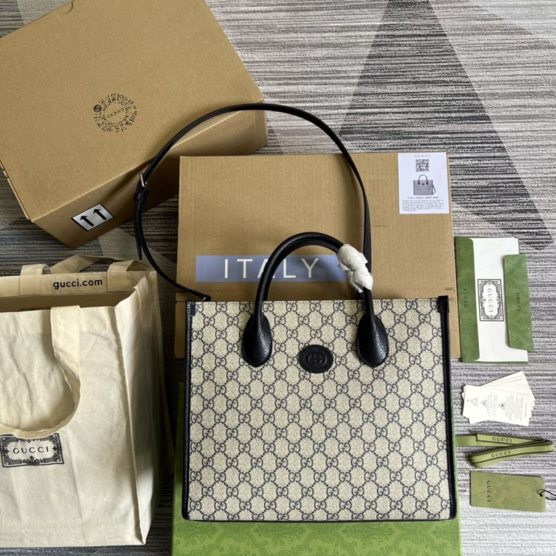 G*u*i shopping bags